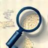Magnifying glass over market data icon